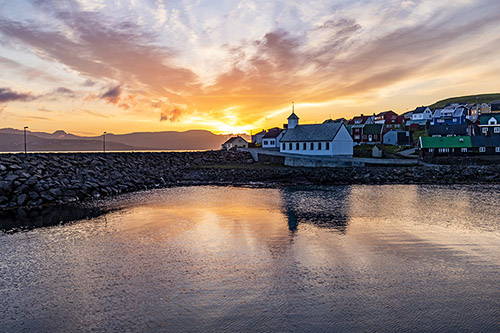 Sunset in Nólsoy Harbour, Faroe Islands Sunset in Nólsoy Harbour, Faroe Islands