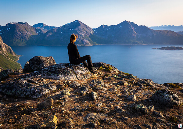 Admiring the view from Brosmetinden hiking trail, Tromvik, Northern Norway Admiring the view from Brosmetinden hiking trail, Tromvik, Northern Norway