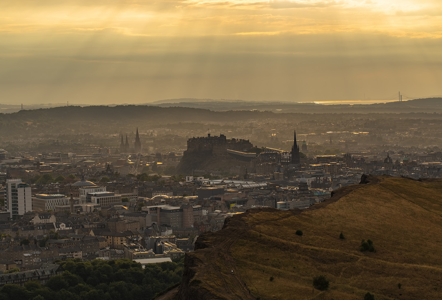 Rays of sunshine over Edinburgh from Arthur's Seat Rays of sunshine over Edinburgh from Arthur's Seat