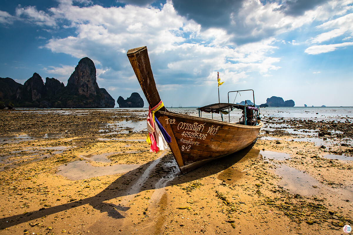 Long-tail boat at Tonsai Beach, low tide, Krabi, Thailand