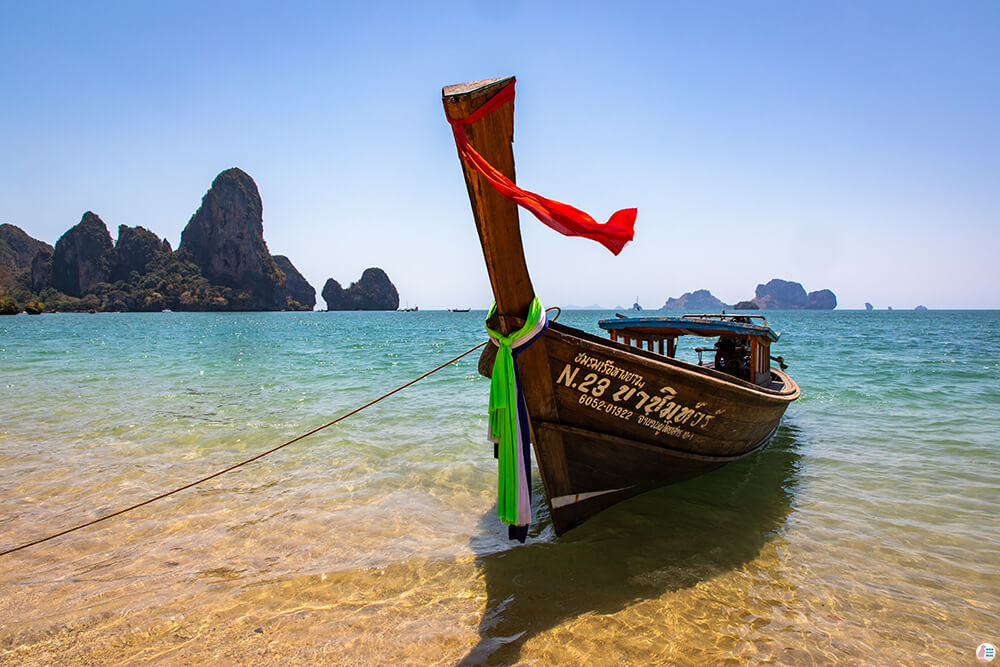 Long-tail boat at Tonsai Beach, high tide, Krabi, Thailand